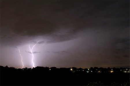 Thunderbolt and heavy storm in the town Stock Photo - Budget Royalty-Free & Subscription, Code: 400-05217876