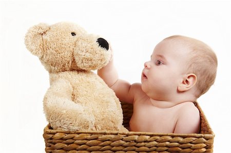 simsearch:400-06080069,k - Baby sit in backet with big bear and touching him Stock Photo - Budget Royalty-Free & Subscription, Code: 400-05217954