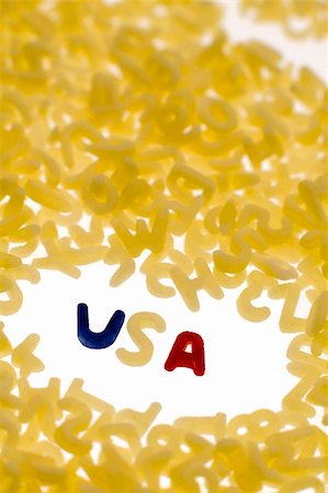 food for the fourth - USA text made of pasta colorized letters, vertical photo, shallow depth of view Stock Photo - Budget Royalty-Free & Subscription, Code: 400-05218248