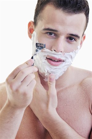simsearch:6107-06117509,k - young man shave isolated on white Foto de stock - Super Valor sin royalties y Suscripción, Código: 400-05218737