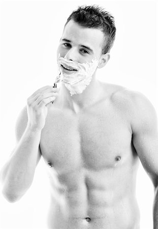 face cream male - young man shave isolated on white Stock Photo - Budget Royalty-Free & Subscription, Code: 400-05218739