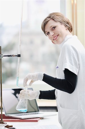 student with laptop in chemistry lab - science chemistry classes with young student woman in labaratory Stock Photo - Budget Royalty-Free & Subscription, Code: 400-05218785