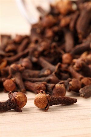 simsearch:400-04754857,k - Closeup of cloves on a wooden table. Shallow dof, selective focus Stock Photo - Budget Royalty-Free & Subscription, Code: 400-05218941