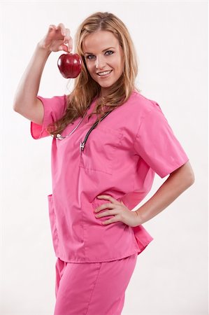 Attractive blonde caucasian nurse doctor in her twenties Fotografie stock - Microstock e Abbonamento, Codice: 400-05219137