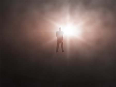 Man walking from dark abyss into a bright light abstract. Stock Photo - Budget Royalty-Free & Subscription, Code: 400-05219230