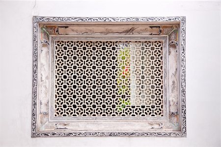 exterior window designs frames - Chinese old style plaste window in an ancient Chinese house. Stock Photo - Budget Royalty-Free & Subscription, Code: 400-05210065