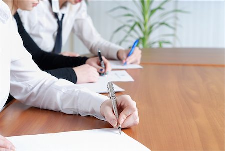 person's hand signing an important document Stock Photo - Budget Royalty-Free & Subscription, Code: 400-05210860