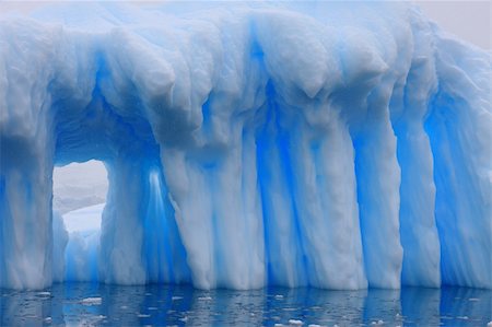 pole expedition - Iceberg and azure water in Antarctica Stock Photo - Budget Royalty-Free & Subscription, Code: 400-05211154