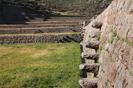 Ancient ruins of Machu Picchu in Peru on a sunny day Fotografie stock - Microstock e Abbonamento, Codice: 400-05211188