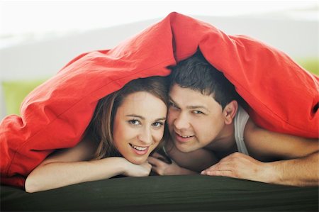simsearch:400-04123173,k - happy young couple in bed at morning Stock Photo - Budget Royalty-Free & Subscription, Code: 400-05211320