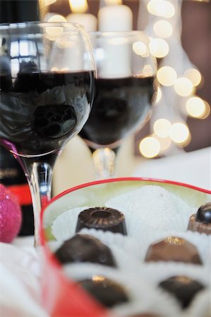 luxury and sweet praline and chocolate with wine bottle and glasses  decoration Stock Photo - Budget Royalty-Free & Subscription, Code: 400-05211831