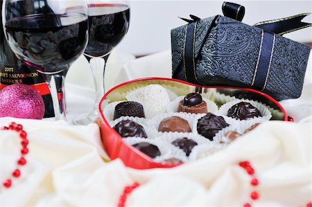 luxury and sweet praline and chocolate with wine bottle and glasses  decoration Stock Photo - Budget Royalty-Free & Subscription, Code: 400-05211840