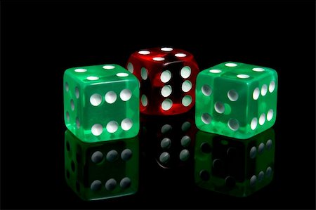simsearch:400-06911675,k - Three casino dice on a black background Stock Photo - Budget Royalty-Free & Subscription, Code: 400-05212014
