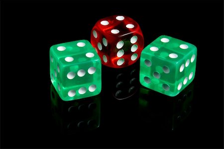 simsearch:400-06911675,k - Three casino dice on a black background Stock Photo - Budget Royalty-Free & Subscription, Code: 400-05212015