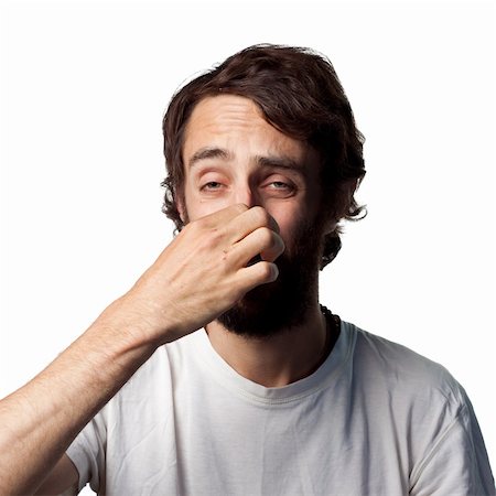 simsearch:400-05213670,k - Man covers his nose due to a bad smell Stock Photo - Budget Royalty-Free & Subscription, Code: 400-05212279