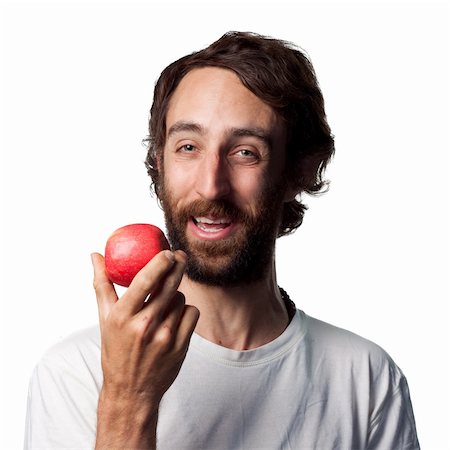 Young man eating a fresh apple Stock Photo - Budget Royalty-Free & Subscription, Code: 400-05212299