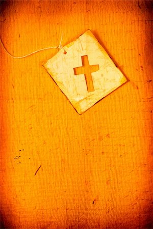 simsearch:400-06087640,k - Close up of handmade paper tag with holy cross Stock Photo - Budget Royalty-Free & Subscription, Code: 400-05212540