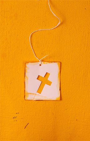 simsearch:400-06087640,k - Close up of handmade paper tag with holy cross Stock Photo - Budget Royalty-Free & Subscription, Code: 400-05212590