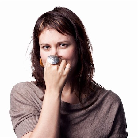 simsearch:400-05213670,k - A bad smell makes this lady cover her nose Stock Photo - Budget Royalty-Free & Subscription, Code: 400-05212769