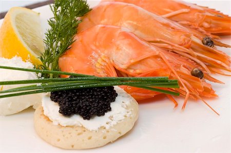 shrimp black - a plate with fresh caviar, chive and shrimps Stock Photo - Budget Royalty-Free & Subscription, Code: 400-05212822