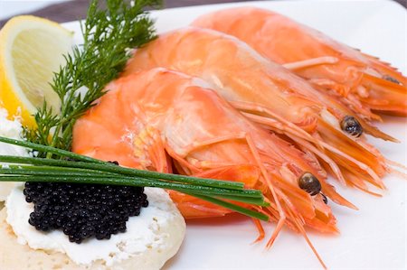 shrimp black - a plate with fresh caviar, chive and shrimps Stock Photo - Budget Royalty-Free & Subscription, Code: 400-05212823