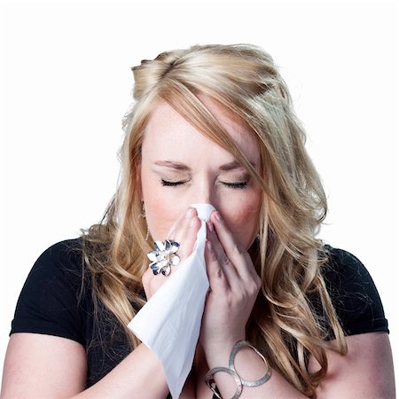 Woman sneezing Stock Photo - Budget Royalty-Free & Subscription, Code: 400-05213077