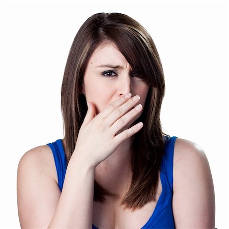 simsearch:400-05213670,k - Covering her nose after a bad smell Stock Photo - Budget Royalty-Free & Subscription, Code: 400-05213184