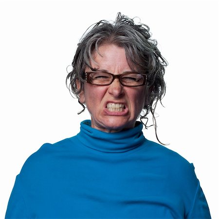 Woman super mad and aggressive, ready to hit someone Stock Photo - Budget Royalty-Free & Subscription, Code: 400-05213265