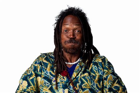 rastafarian - Man puffing out his cheeks and making a funny face Stock Photo - Budget Royalty-Free & Subscription, Code: 400-05213736