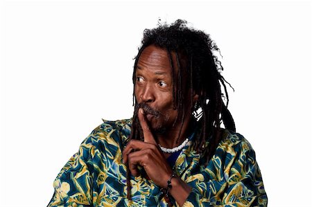 rasta man - Man with fingers on his lips, telling people to be quiet Stock Photo - Budget Royalty-Free & Subscription, Code: 400-05213744