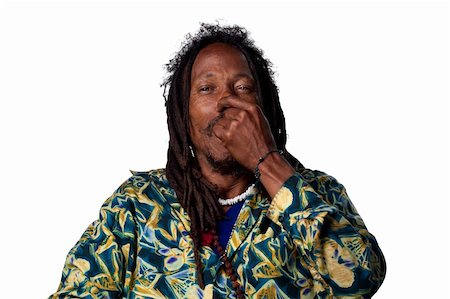 rasta man - Rasta man pinches his nose due to a bad smell Stock Photo - Budget Royalty-Free & Subscription, Code: 400-05213740