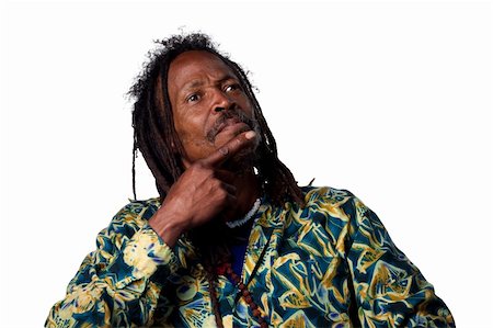 rastafarian - Man with finger on his chin, thinking hard Photographie de stock - Aubaine LD & Abonnement, Code: 400-05213741
