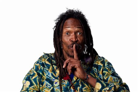 rasta man - Man with fingers on his lips, telling people to be quiet Stock Photo - Budget Royalty-Free & Subscription, Code: 400-05213743