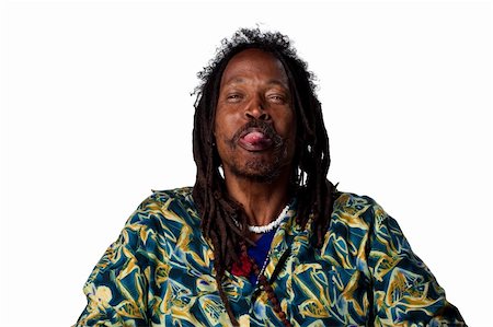 rastafarian - Rasta man sticking his tongue out for a joke Photographie de stock - Aubaine LD & Abonnement, Code: 400-05213751