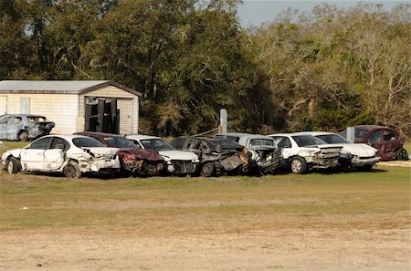 scrap yard pile of cars - Old abandoned cars in junk yard Stock Photo - Budget Royalty-Free & Subscription, Code: 400-05224427