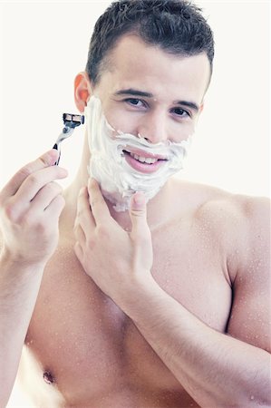 face cream male - young handsome man have shaving isolated on white Stock Photo - Budget Royalty-Free & Subscription, Code: 400-05224487