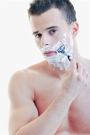 simsearch:6107-06117509,k - young handsome man have shaving isolated on white Foto de stock - Super Valor sin royalties y Suscripción, Código: 400-05224489