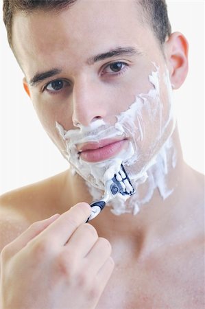 simsearch:6107-06117509,k - young handsome man have shaving isolated on white Foto de stock - Super Valor sin royalties y Suscripción, Código: 400-05224490