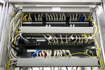 simsearch:400-05137120,k - connected switches in technology room with fiber optic SFP ports Stock Photo - Budget Royalty-Free & Subscription, Code: 400-05226338