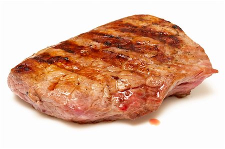 Grilled beef steak isolated over white background Foto de stock - Royalty-Free Super Valor e Assinatura, Número: 400-05226388