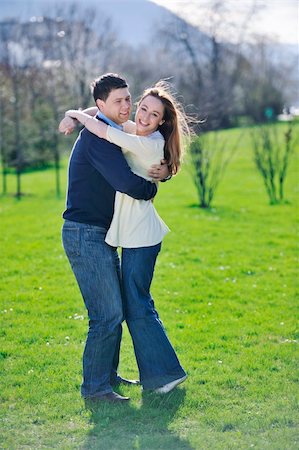 simsearch:400-04702706,k - happy young couple have good time and fun outdoor at beautiful sunny day Stockbilder - Microstock & Abonnement, Bildnummer: 400-05227257
