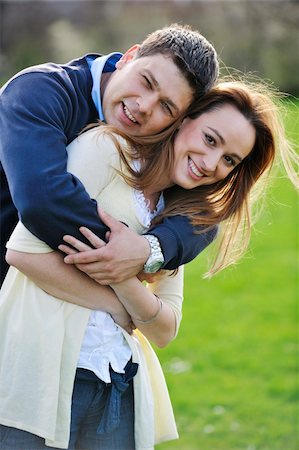 simsearch:400-04702706,k - happy young couple have good time and fun outdoor at beautiful sunny day Stockbilder - Microstock & Abonnement, Bildnummer: 400-05227250