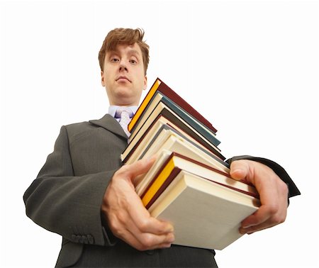 Waggish young man holding a big pile of textbooks Stock Photo - Budget Royalty-Free & Subscription, Code: 400-05227672