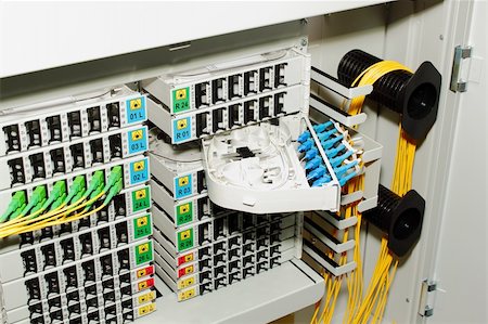 fiber optic cable management system with green and blue SC connectors Stock Photo - Budget Royalty-Free & Subscription, Code: 400-05227846
