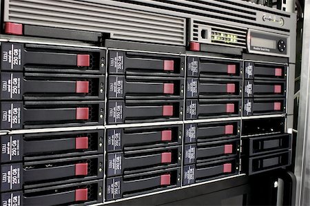 simsearch:400-08967515,k - servers stack with hard drives in a datacenter for backup and data storage Stock Photo - Budget Royalty-Free & Subscription, Code: 400-05227843