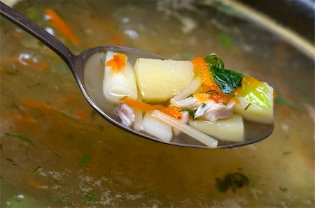 Soup with chicken and vegetables macro closeup shot Fotografie stock - Microstock e Abbonamento, Codice: 400-05228242