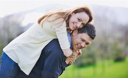 simsearch:400-04702706,k - happy young couple have good time and fun outdoor at beautiful sunny day Stockbilder - Microstock & Abonnement, Bildnummer: 400-05228954