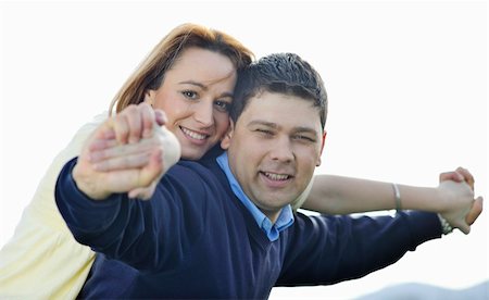 simsearch:400-04702706,k - happy young couple have good time and fun outdoor at beautiful sunny day Stockbilder - Microstock & Abonnement, Bildnummer: 400-05229004