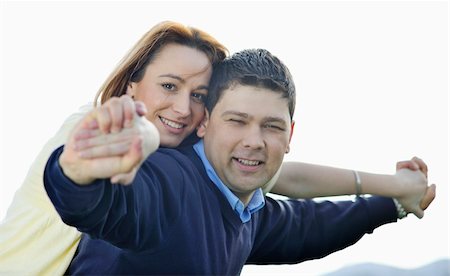 simsearch:400-04702706,k - happy young couple have good time and fun outdoor at beautiful sunny day Stockbilder - Microstock & Abonnement, Bildnummer: 400-05229003