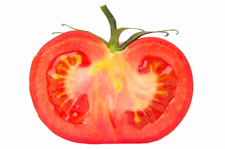 Tomato's half macro shot isolated over white background Fotografie stock - Microstock e Abbonamento, Codice: 400-05229192
